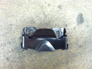 Liftgate Latch Striker. Note the slotted mounting holes.